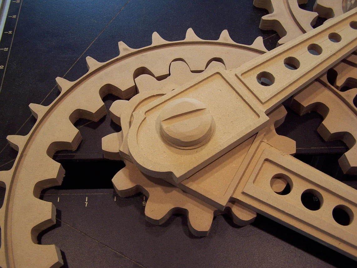 Wooden Gear Sculpture in Progress: 9 large wood gears; 2 coupling rods; 6 small accessories