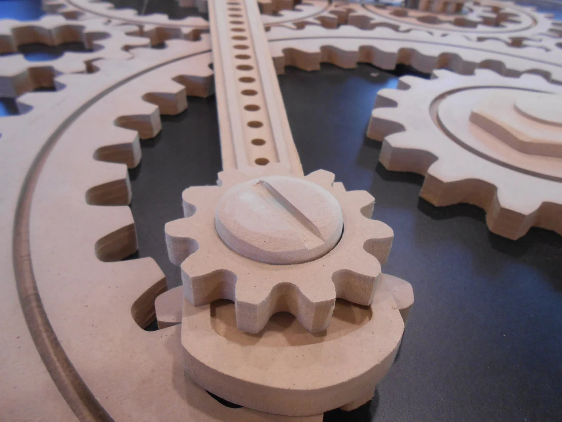 Wooden Gear Sculpture in Progress: 9 large wood gears; 2 coupling rods; 6 small accessories